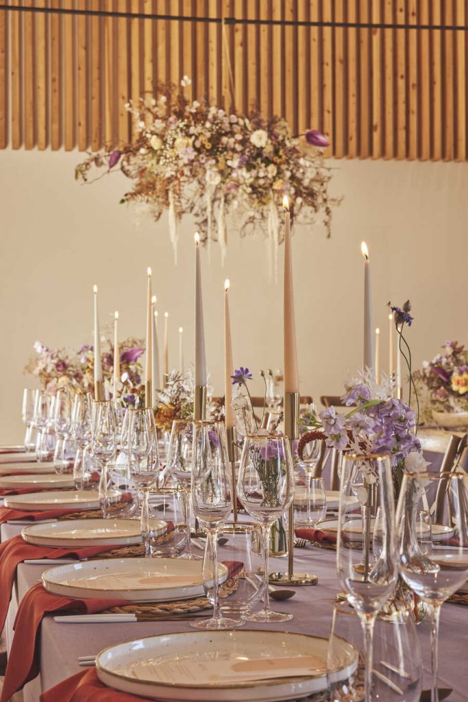 A contemporary wedding palette of lilac, mauve and burnt orange for vineyard wedding inspired by the Mediterranean sunset