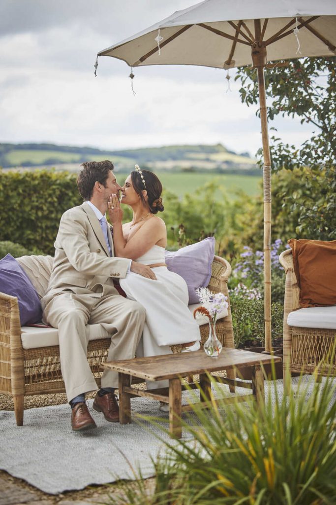 A contemporary wedding palette of lilac, mauve and burnt orange for vineyard wedding inspired by the Mediterranean sunset