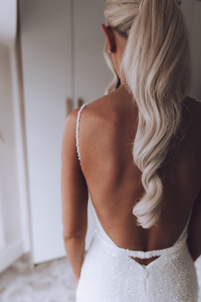 Bride Rea stunning in Made with Love Bridal's Lola gown
