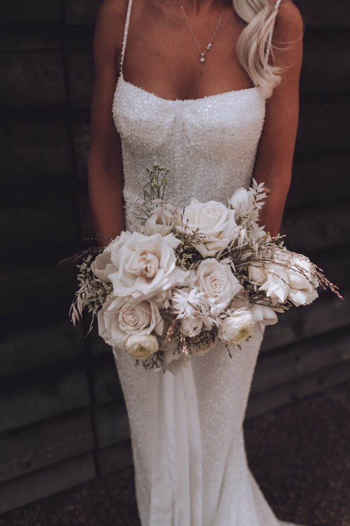 Bride Rea stunning in Made with Love Bridal's Lola gown