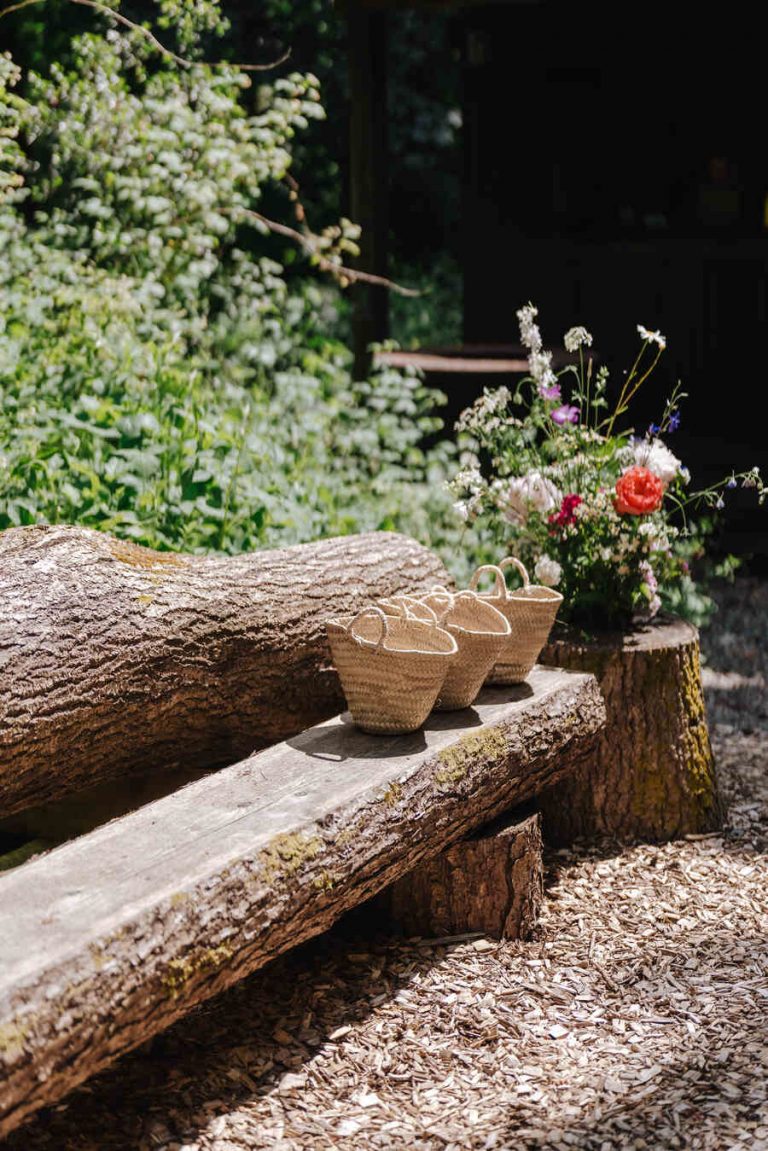 Understated styling with a hint of wildflowers for an intimate woodland wedding