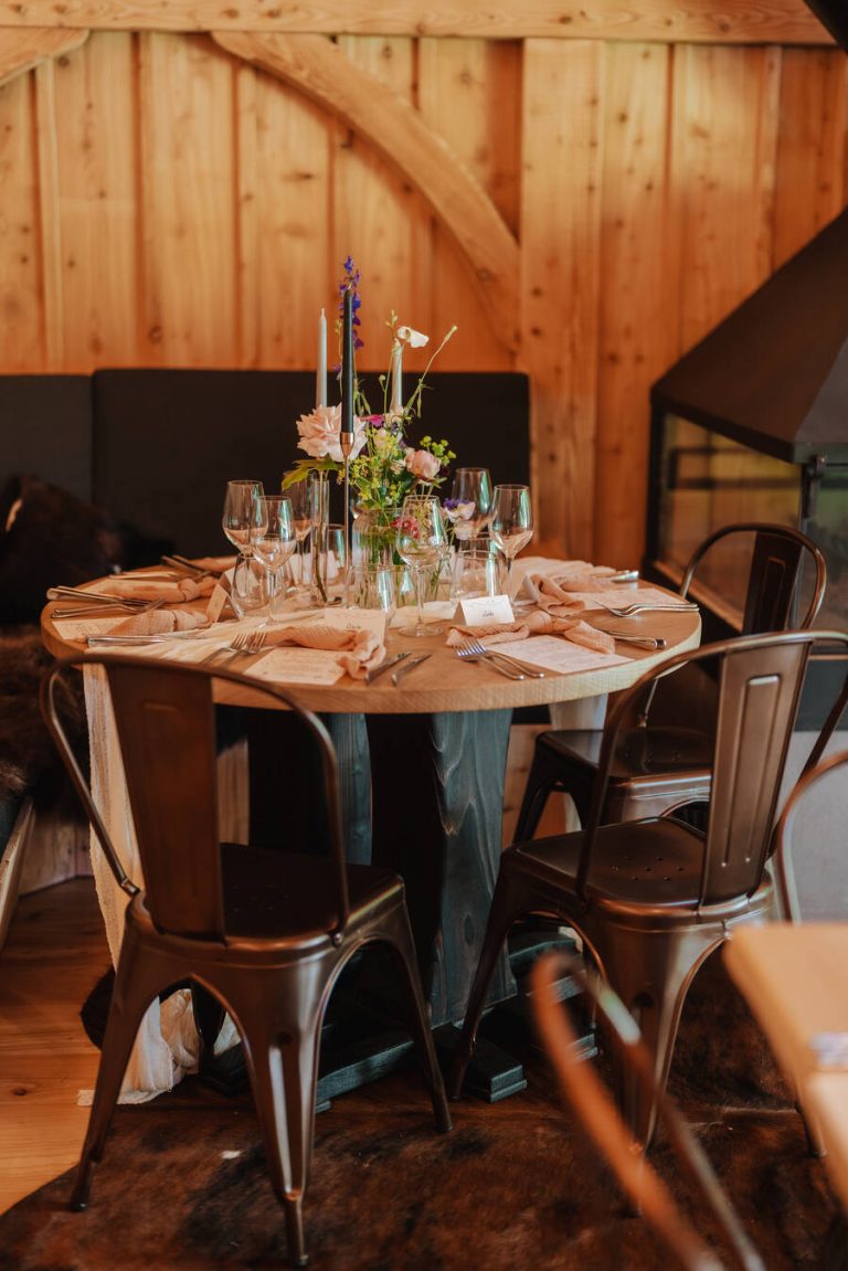 Understated styling with a hint of wildflowers for an intimate woodland wedding