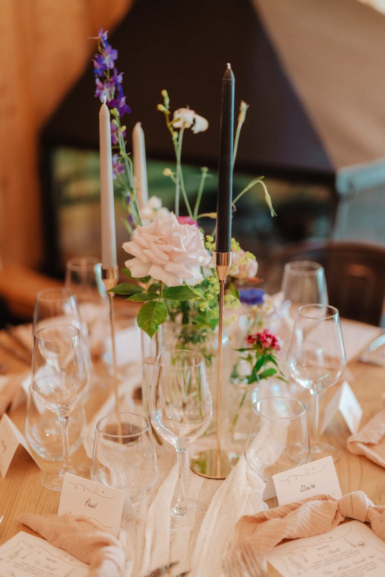 Understated styling with a hint of wildflowers for an intimate woodland wedding
