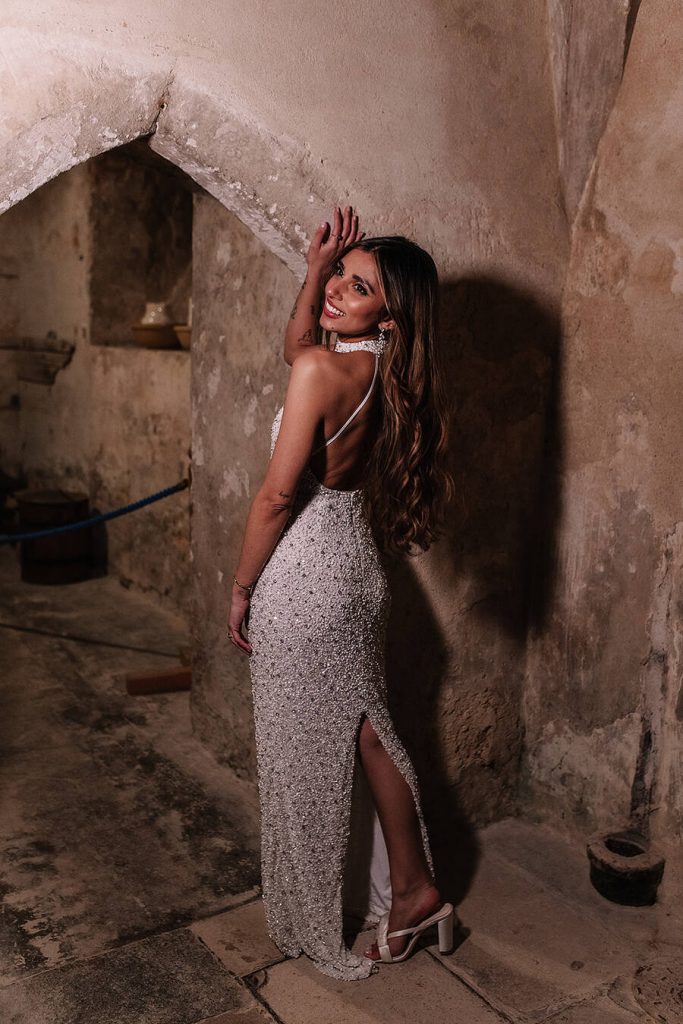 Bride Roxy ready to hit the dance floor in a head to toe sequinned halterneck