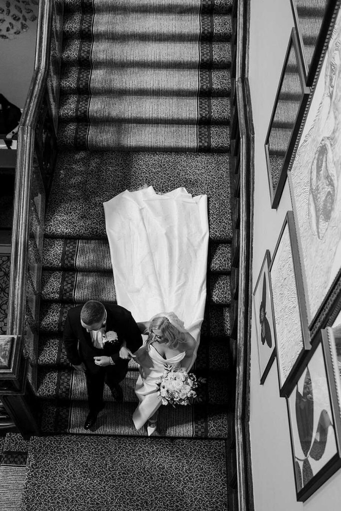 Bride Kirsty, on the way to the altar, arm and arm with her brother