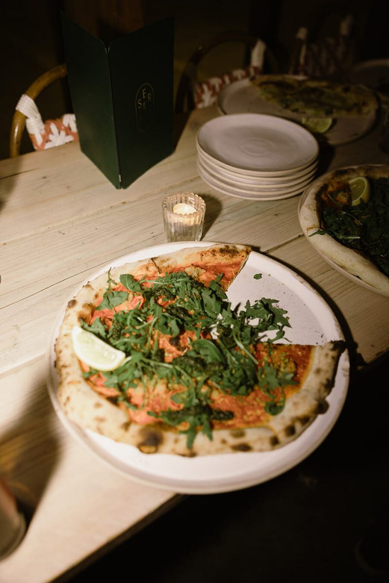 Freshly made stone baked pizza for wedding guests to feast on at Serata Hall