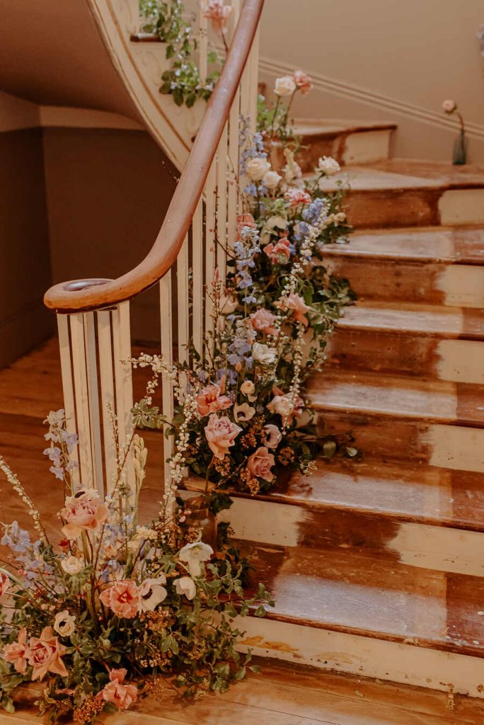 An abundance of colourful florals adorning Polstrong Manor, a renovated country house wedding venue