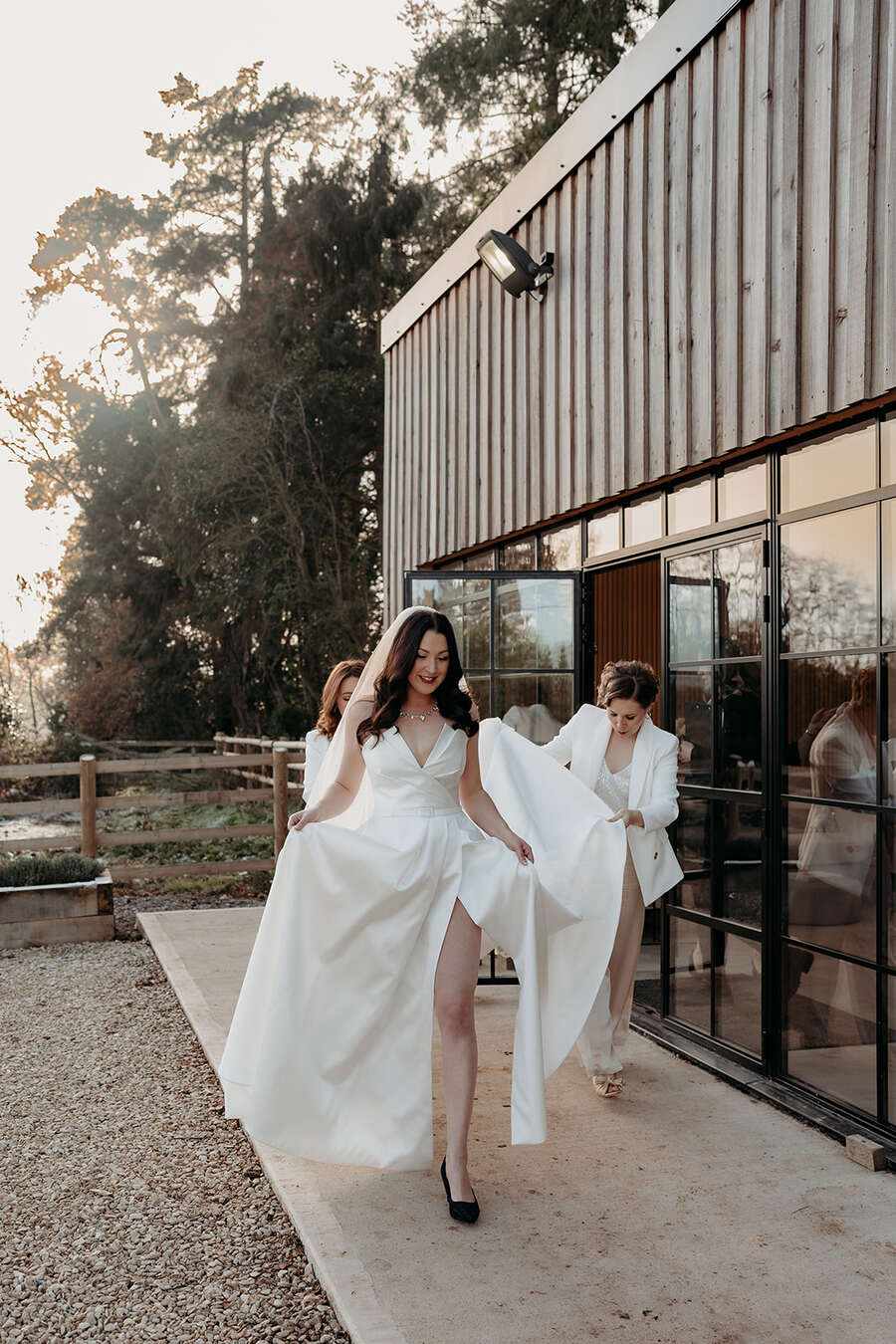 Bride Rebecca of Rebecca Anne Designs wearing her own bespoke veil, teamed with a Suzanne Neville wedding gown and Tilly Thomas Lux accessories