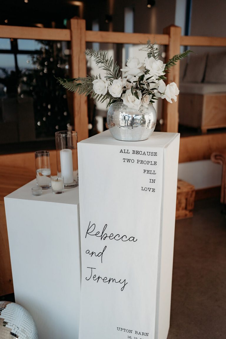 Handstitched fabric welcome wedding signage, in monochrome to echo the elegant wedding's aesthetics