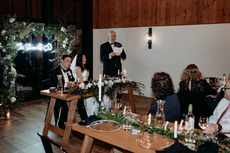 Elegant, contemporary winter wedding styling at Devonshire's Upton Barn with a green and white palette and a mass of mirror balls