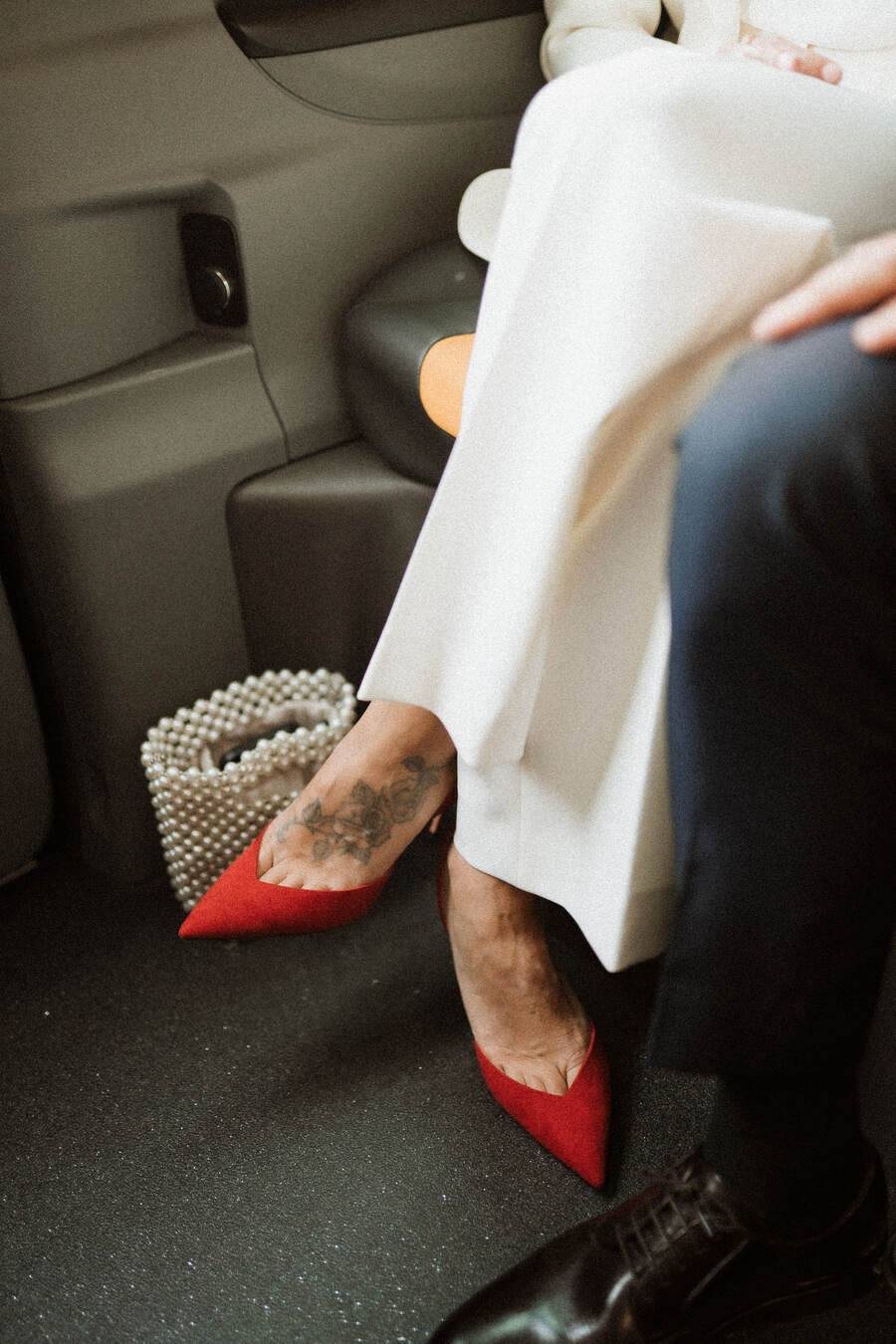 A chic tailored white bridal suit from The Kooples for cool London bride Lauren