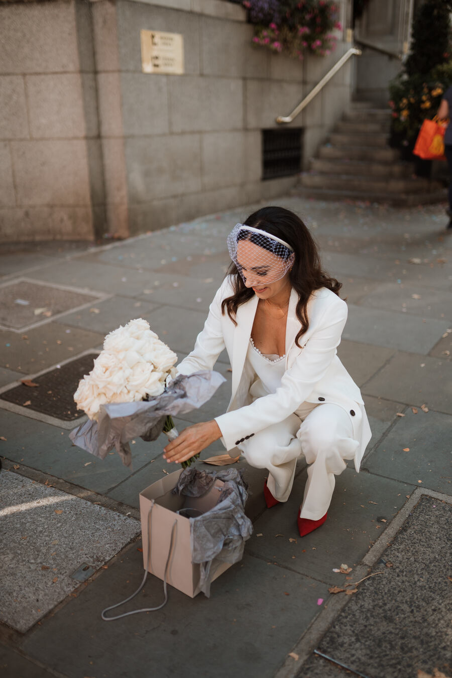 A chic tailored white bridal suit from The Kooples for cool London bride Lauren