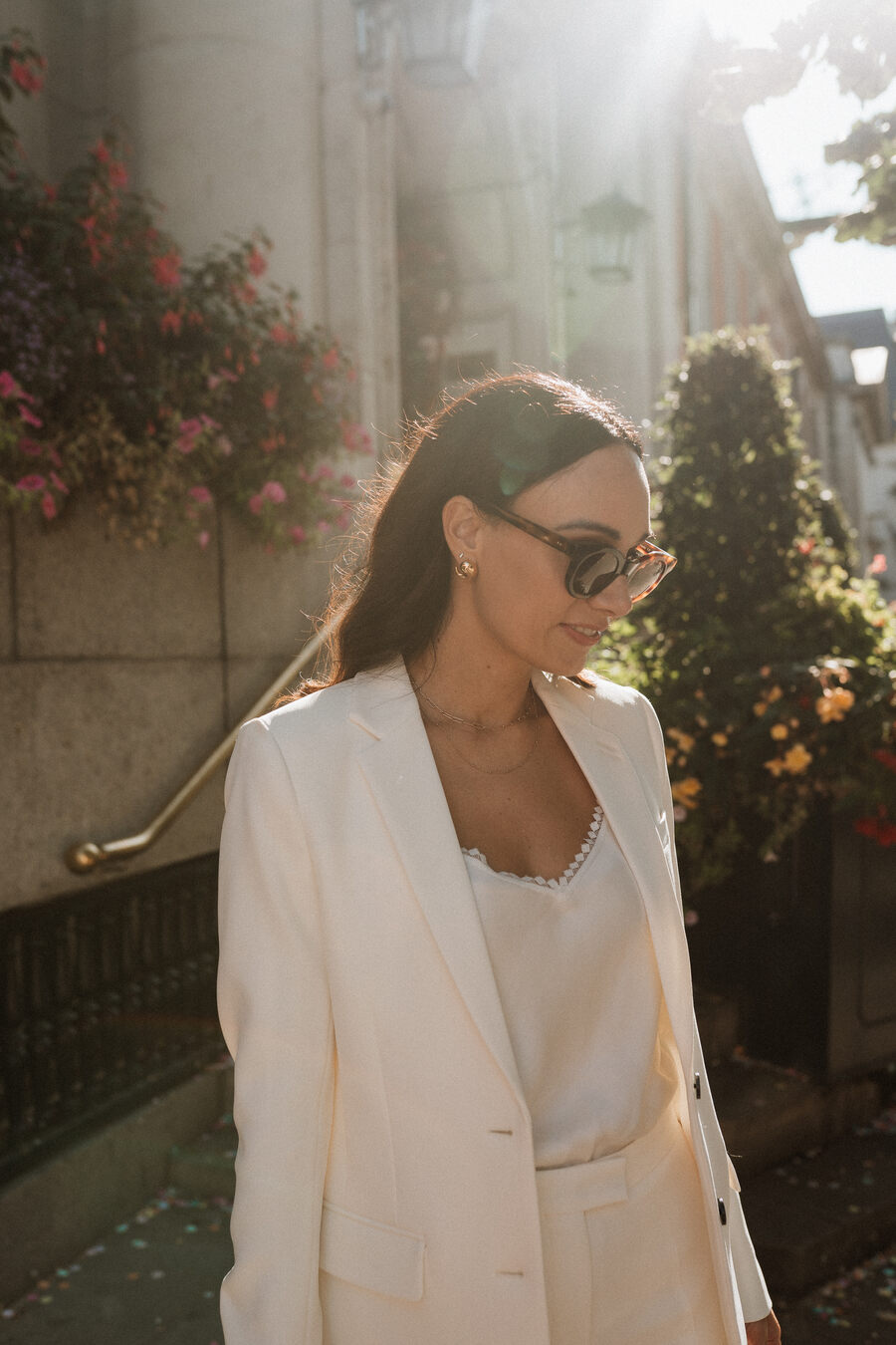 A chic tailored white bridal suit from The Kooples for cool London bride Lauren
