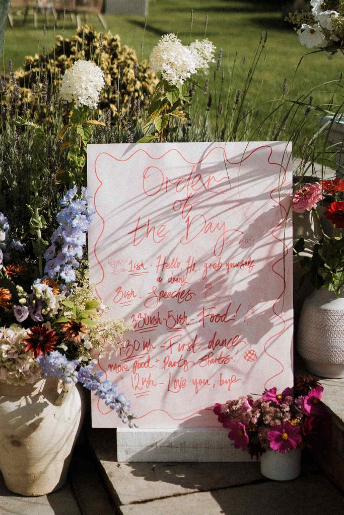 Gloriously colourful fresh blooms for a laid-back summer garden party wedding