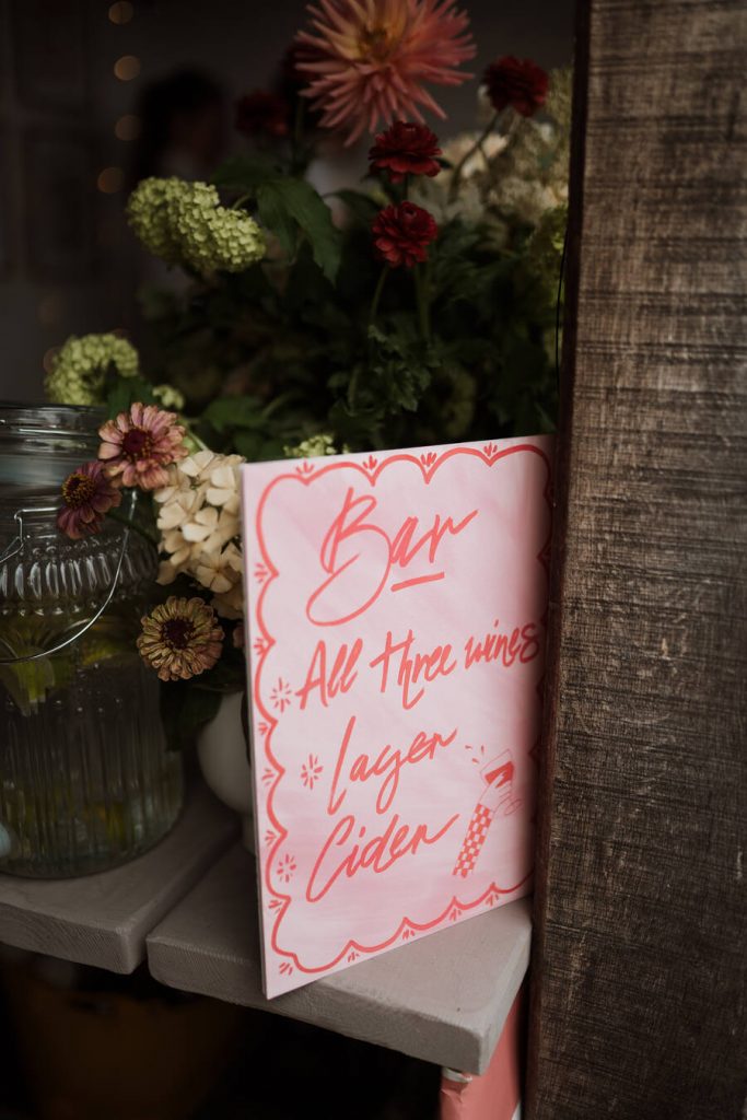 Gloriously colourful fresh blooms for a laid-back summer garden party wedding