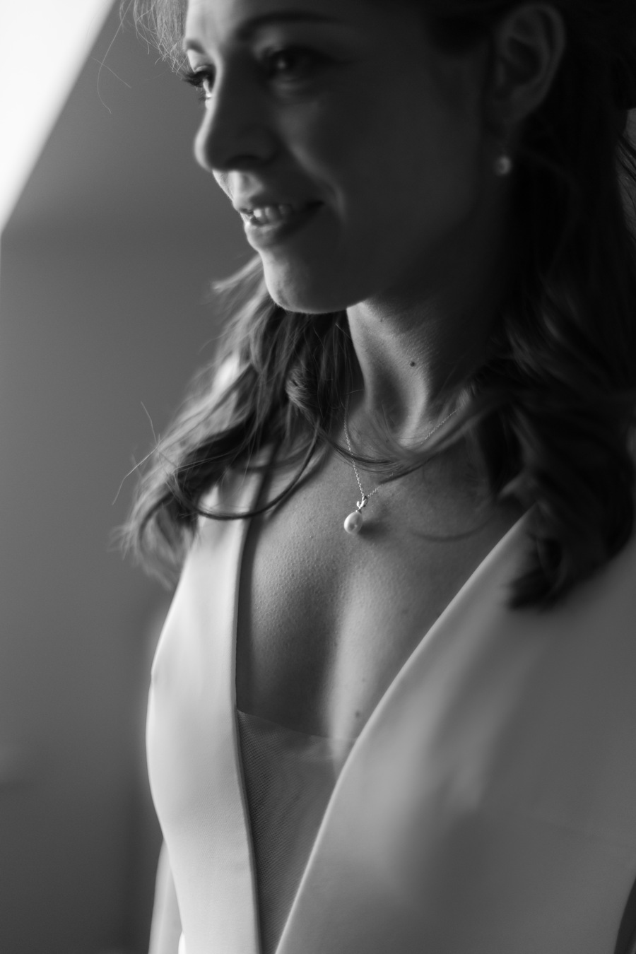 Bride Lucy's elegant and minimal bridal style wearing a pearl scattered Maggie Sottero wedding gown