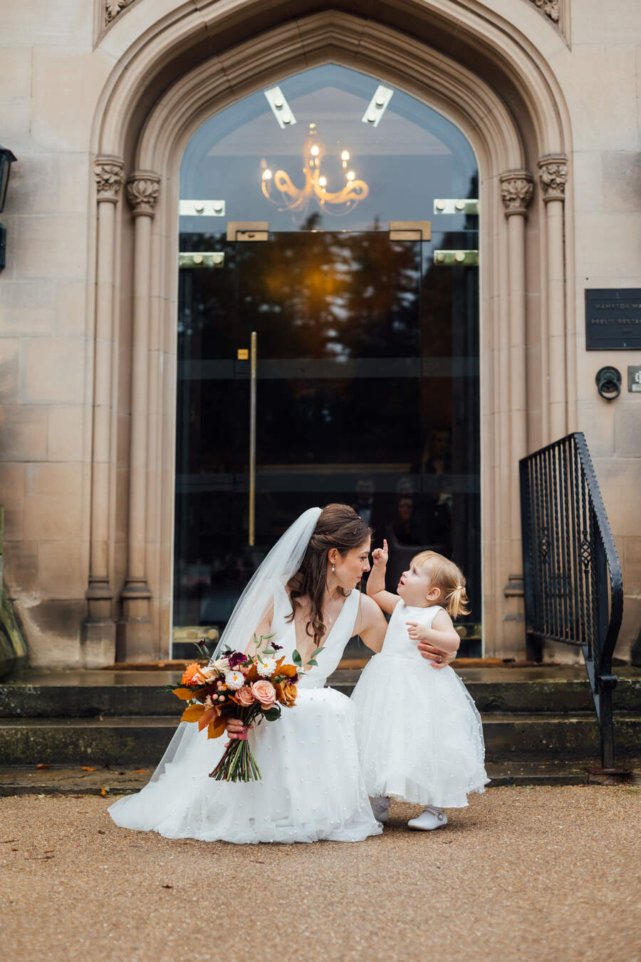 Bride Lucy's elegant and minimal bridal style wearing a pearl scattered Maggie Sottero wedding gown