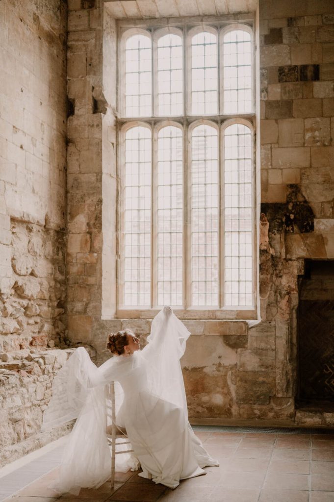 Elegant all white wedding inspiration for the modern bride at Gloucestershire's historic Blackfriars Priory
