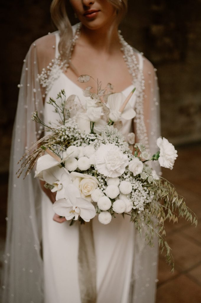 Elegant all white wedding inspiration for the modern bride at Gloucestershire's historic Blackfriars Priory