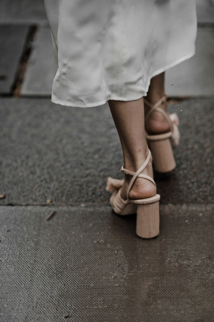 A Reformation dress, Eden B bridal bow and Loeffler Randall pleated heels for London bride Lucy