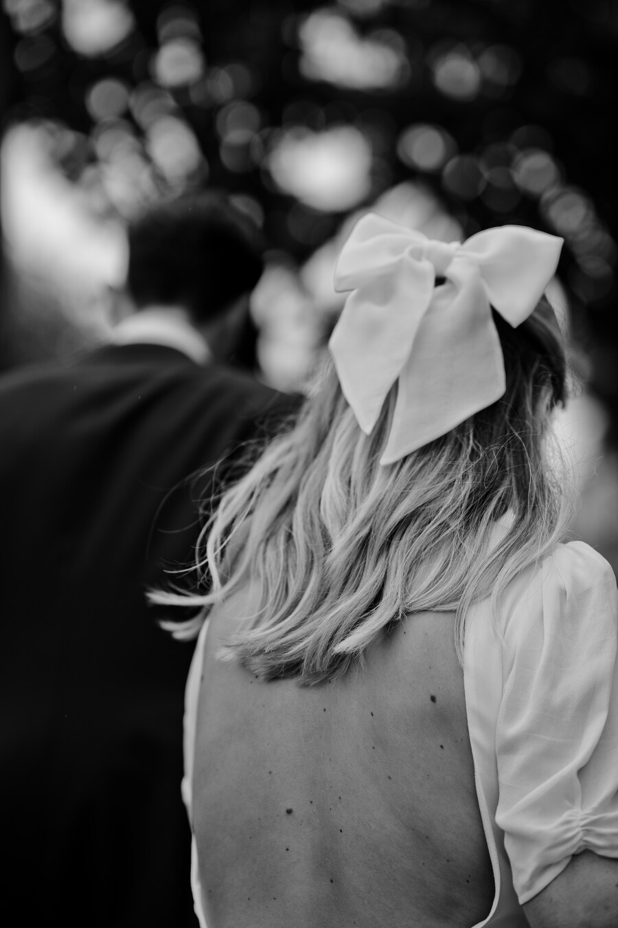 A Reformation dress, Eden B bridal bow and Loeffler Randall pleated heels for London bride Lucy