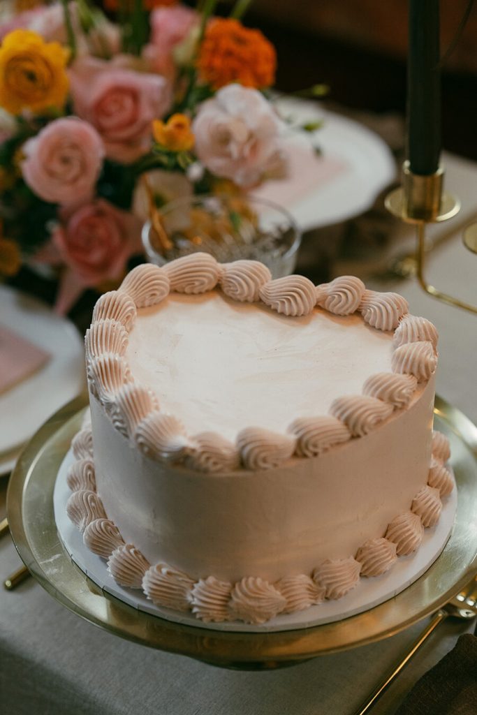 Colourful wedding scenes in a zesty palette of pinks, oranges and yellows at London's Yaatra Restaurant | Lynn Shapiro Photography