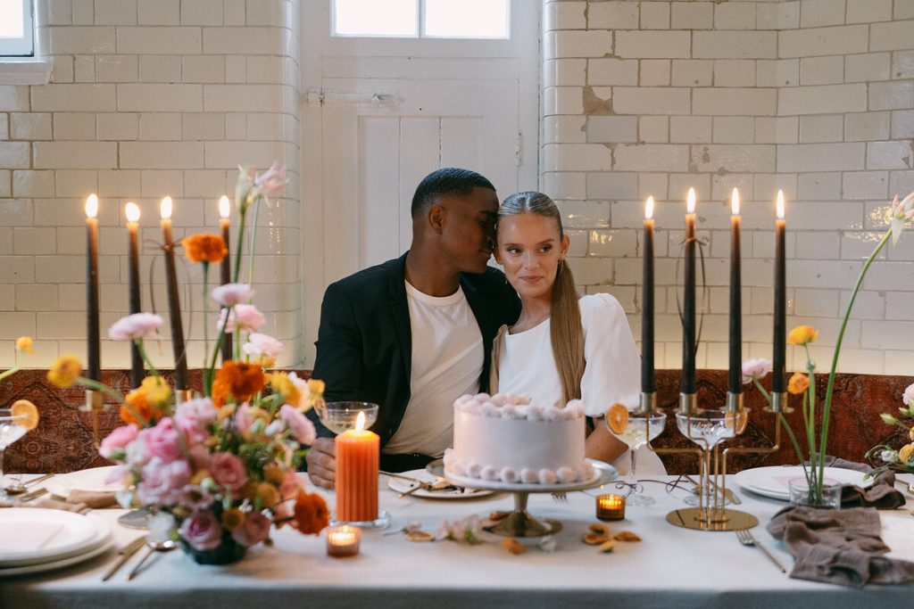 Colourful wedding scenes in a zesty palette of pinks, oranges and yellows at London's Yaatra Restaurant | Lynn Shapiro Photography