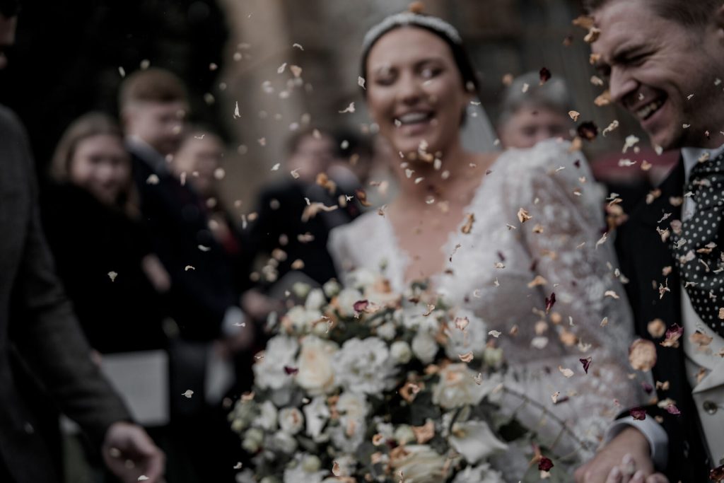 Confetti moments for newlyweds Bec and Gil as they exit their Church service as Mr & Mrs