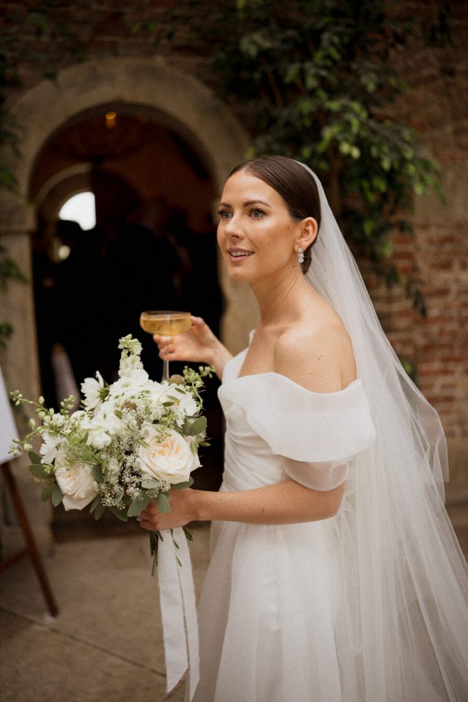 Beautiful bride Lauren, elegant in a sweetheart neckline, off the shoulder elegant organza NEWHITE wedding dress