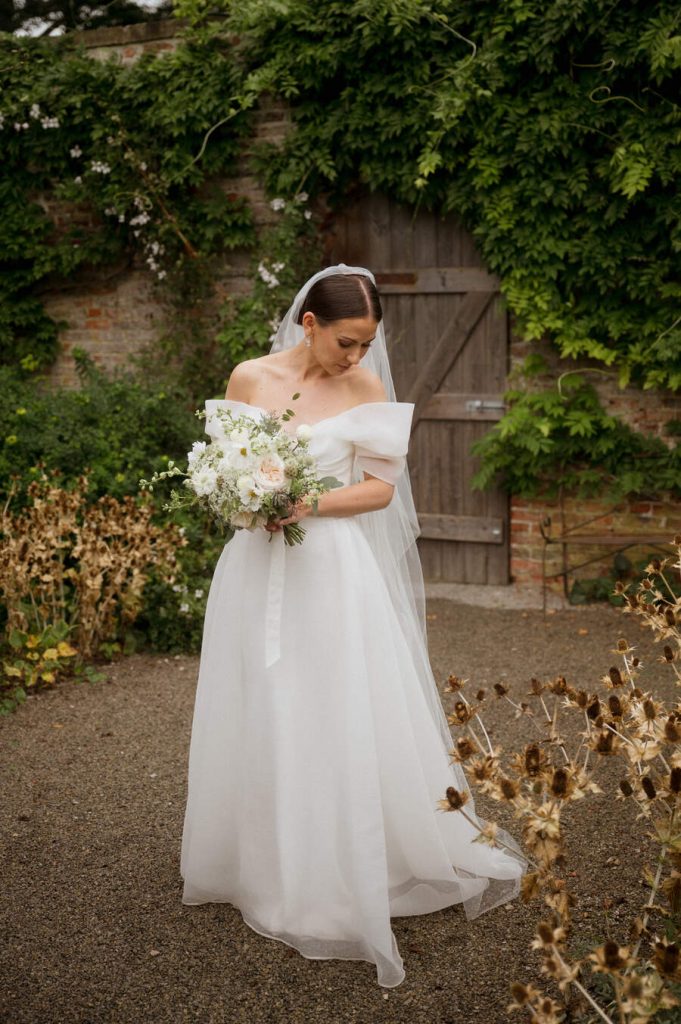 Beautiful bride Lauren, elegant in a sweetheart neckline, off the shoulder elegant organza NEWHITE wedding dress