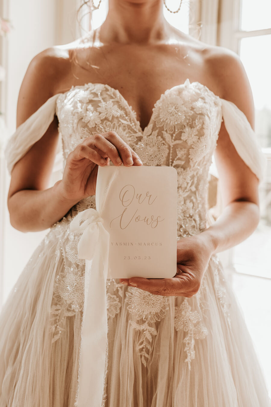 A romantic, elegant bridal look for a nude luxe wedding aesthetic at Hodsock Priory