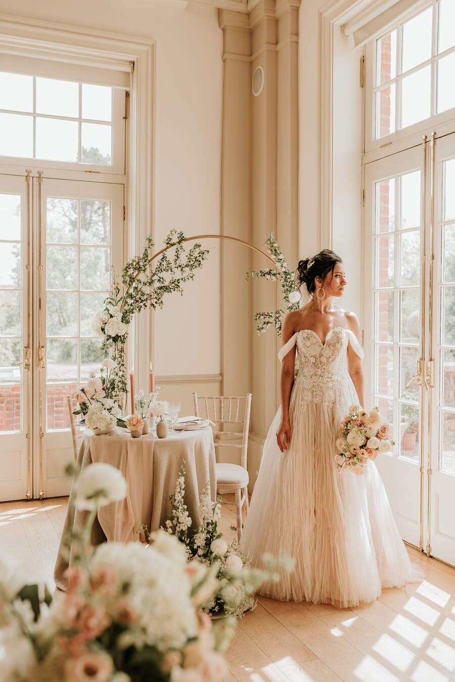 A romantic, elegant bridal look for a nude luxe wedding aesthetic at Hodsock Priory