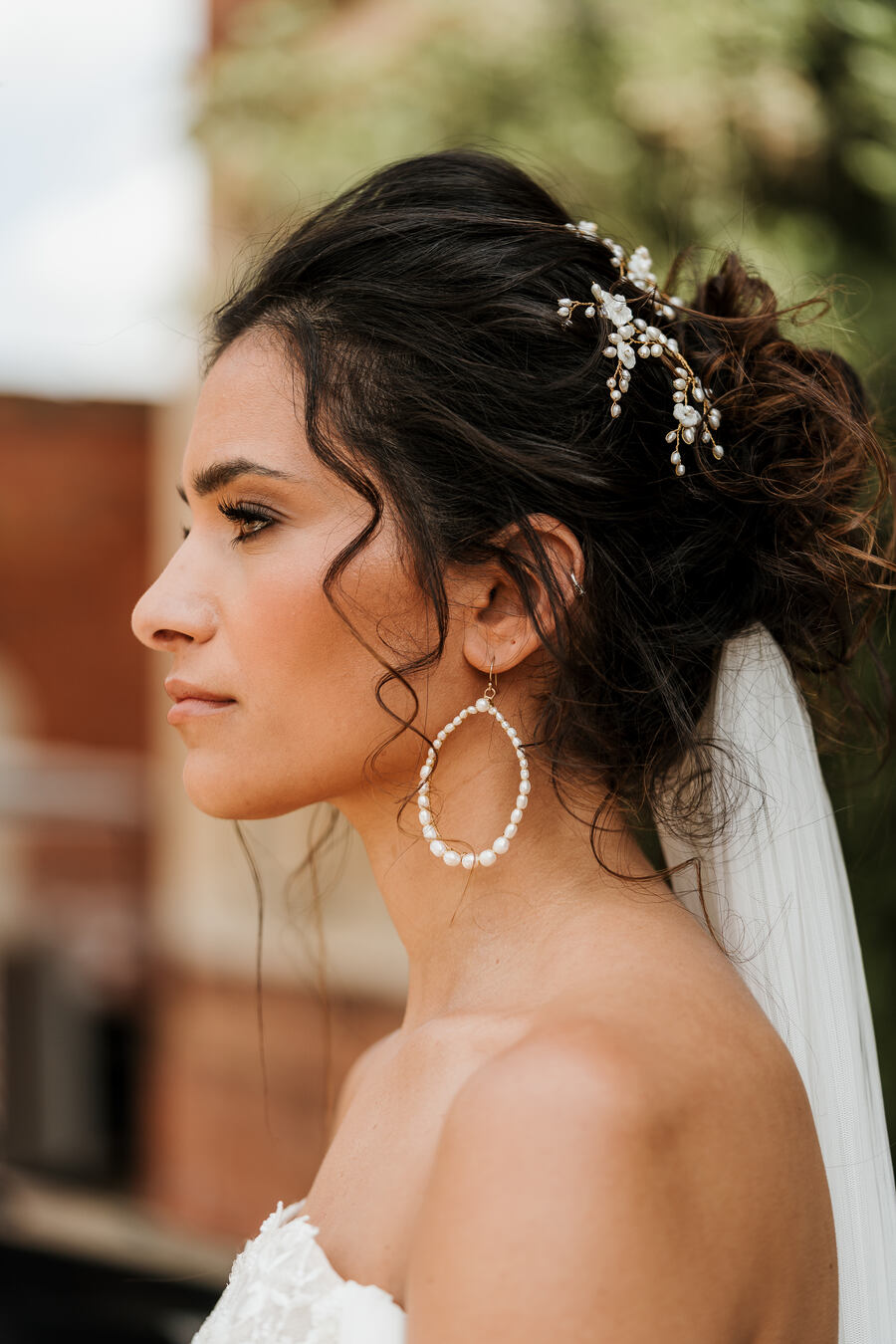 A romantic, elegant bridal look for a nude luxe wedding aesthetic at Hodsock Priory