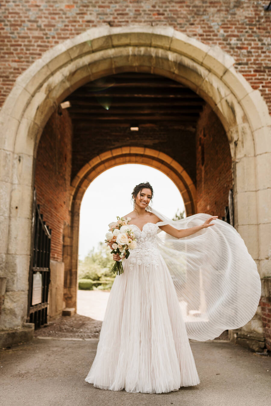 A romantic, elegant bridal look for a nude luxe wedding aesthetic at Hodsock Priory