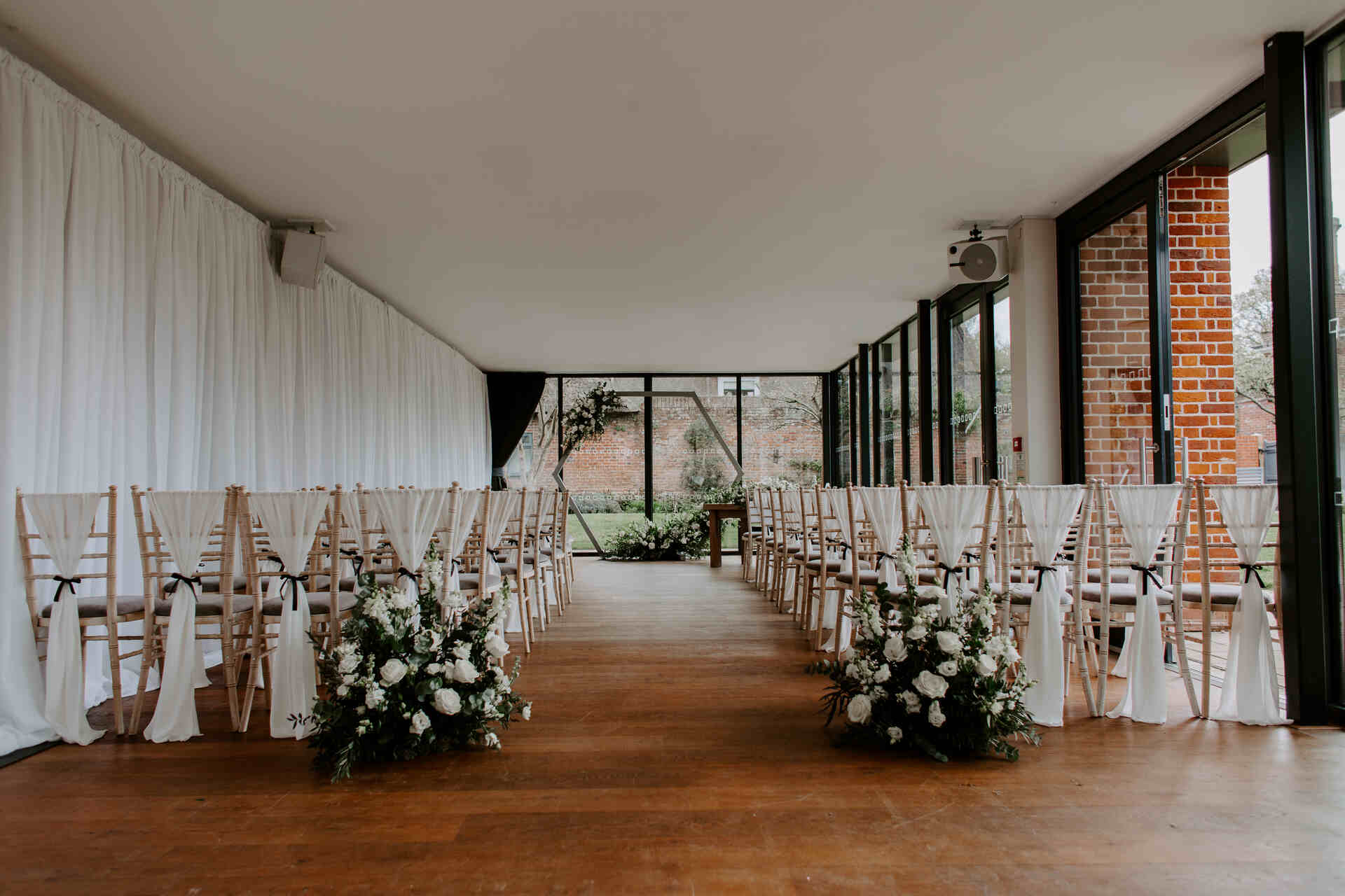 An elegant, contemporary monochrome palette for Kate and Alex's spring wedding at The Norfolk Mead Hotel