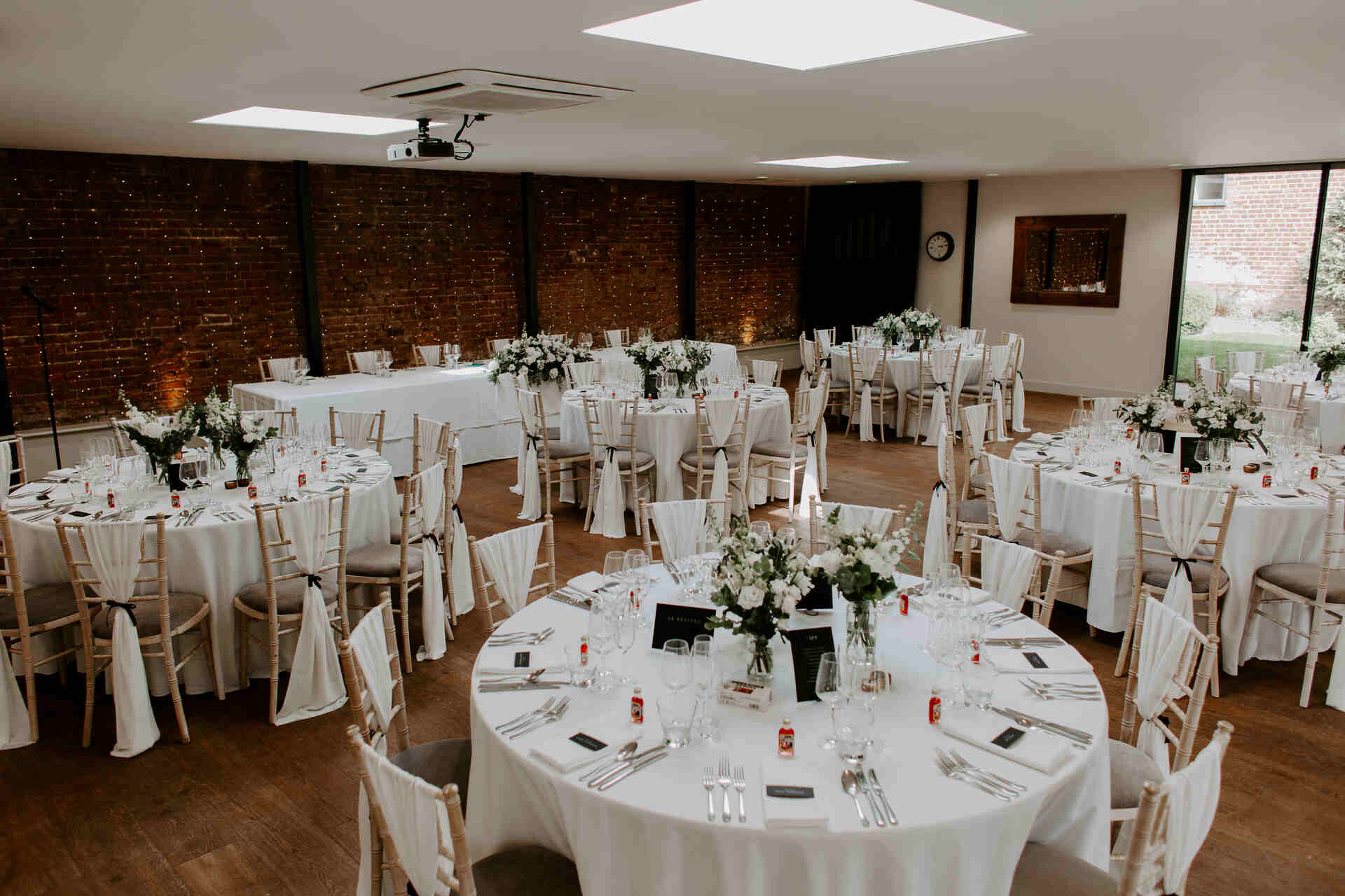 An elegant, contemporary monochrome palette for Kate and Alex's spring wedding at The Norfolk Mead Hotel